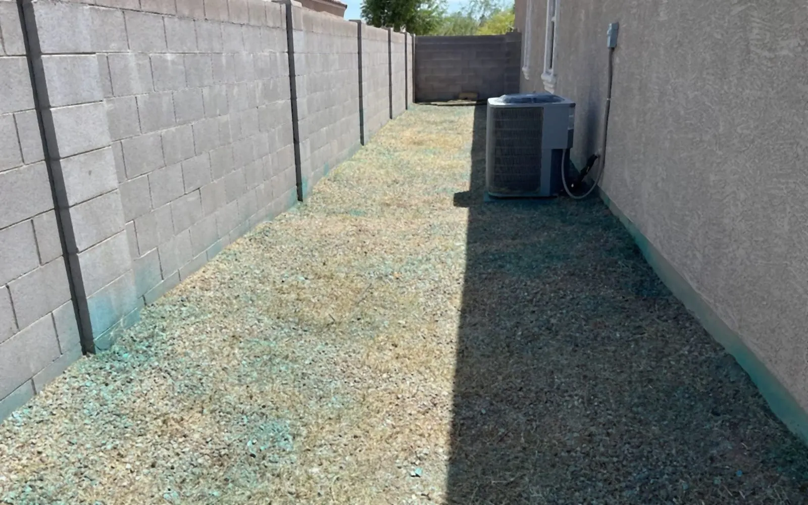 The same side yard cleared to clean gravel